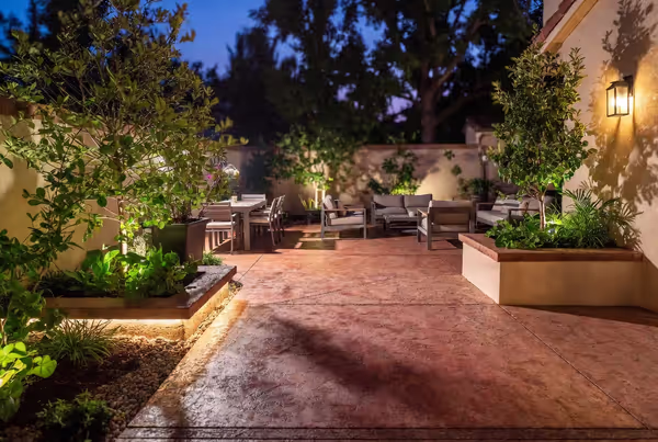 decorative concrete patio with stamped finish and modern outdoor seating